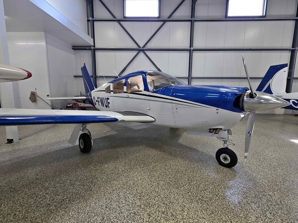 Exterior view of a 1967 Piper PA-28R-180 for sale in QC